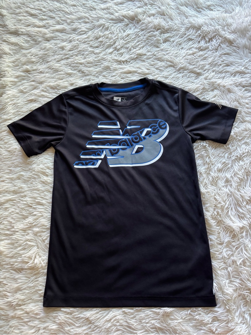 New Balance Black Tee with Bright Blue Neck Trim